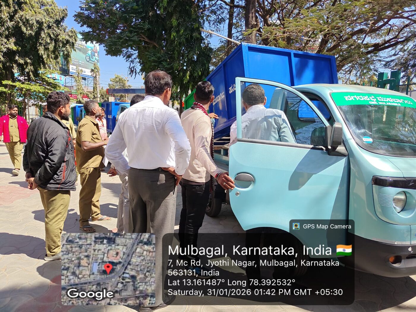Officials examining the vehicle cabin and driver controls